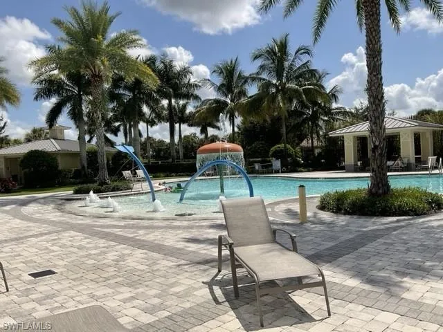 View of pool with pool water feature