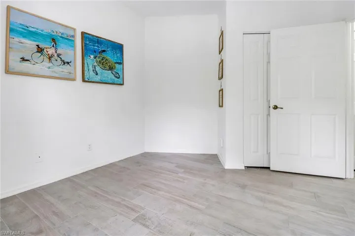 Unfurnished bedroom featuring light hardwood / wood-style floors