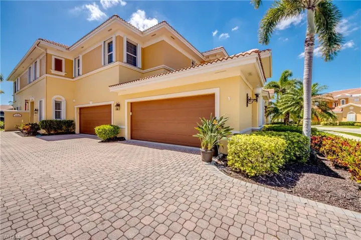 Paver driveway to your 2-car attached garage.