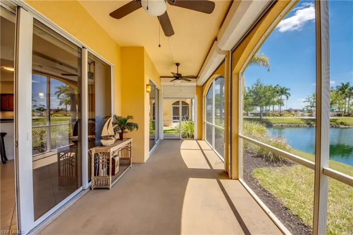 Your screen-in, private waterfront view lanai with electric roll down hurricane shutters.