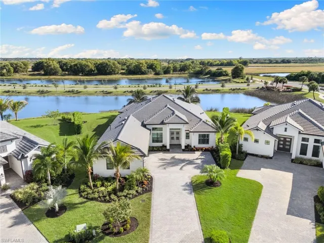 View from above of property with a large body of water