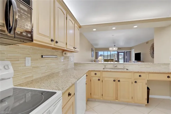 Updated Kitchen with New Granite, Backsplash and Sink
