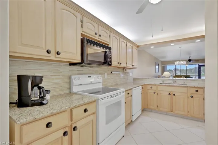 Updated Kitchen with New Granite, Backsplash and Sink