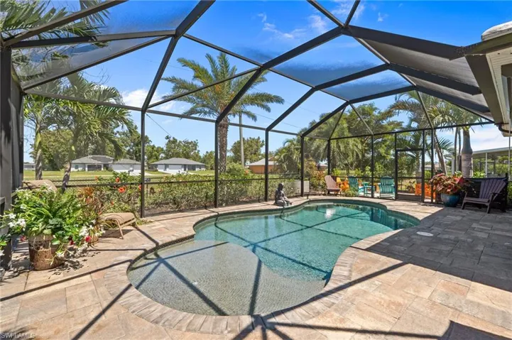 Outdoor pool with a patio