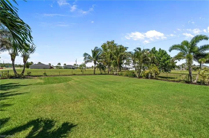 Fenced in Adjacent lot with landscaping & irrigation