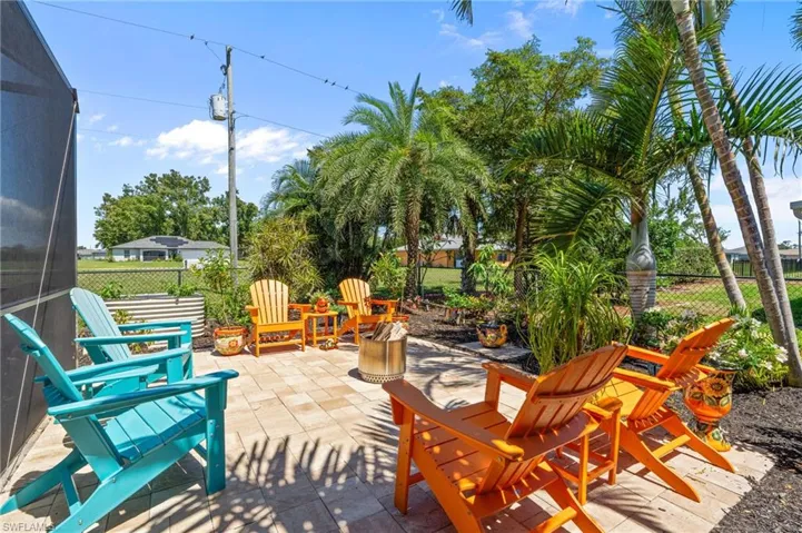 View of patio with a fenced backyard