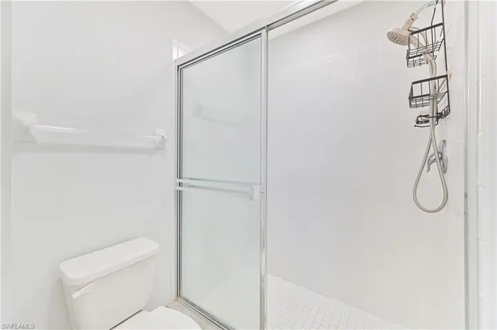 Bathroom featuring a shower stall