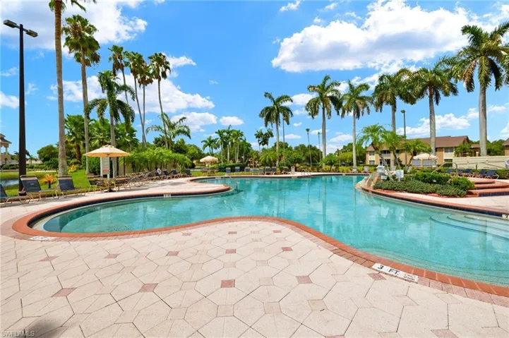 Community pool with a patio area