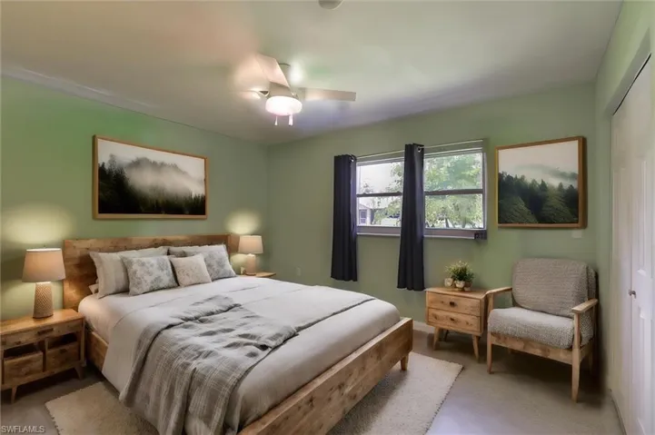 Bedroom featuring a closet and ceiling fan