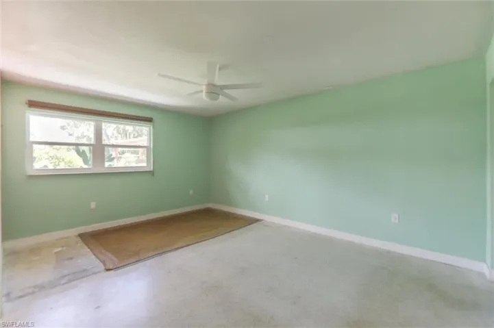 Spare room featuring ceiling fan