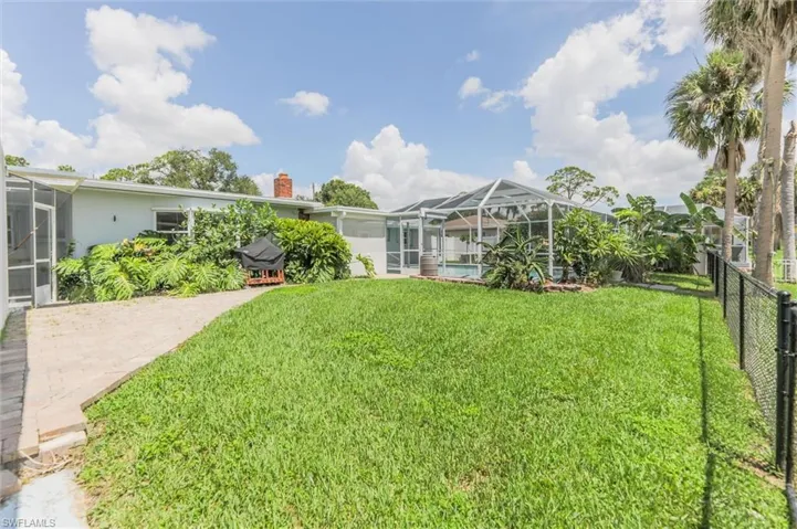 View of yard featuring a lanai