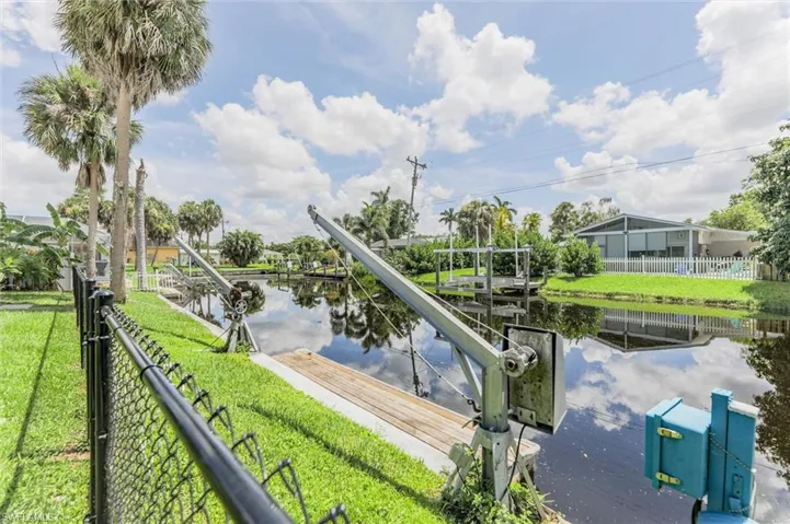 Water view with a boat dock