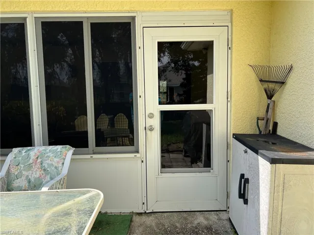 View of doorway to sunroom