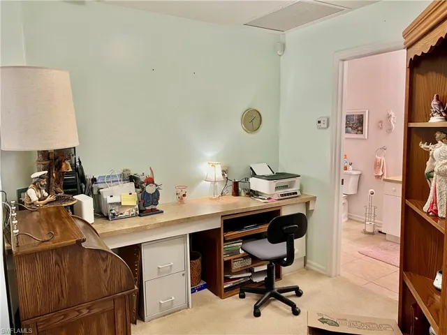 Office space with light tile patterned flooring
