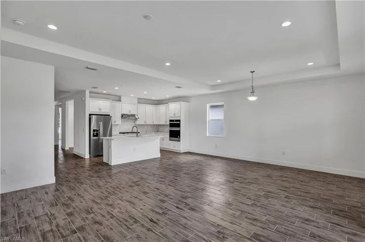 Great room with tray ceiling
