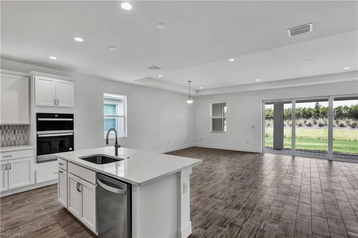 Open-concept floor plan with kitchen layout pictured