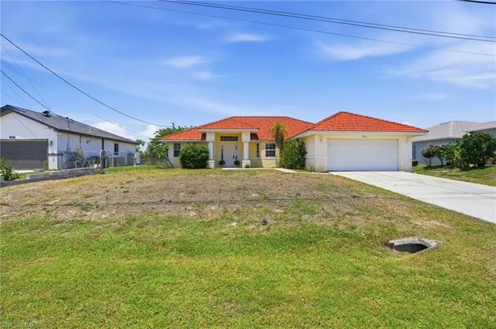 1011  Chadbourne  AVE, Lehigh Acres, FL 33971