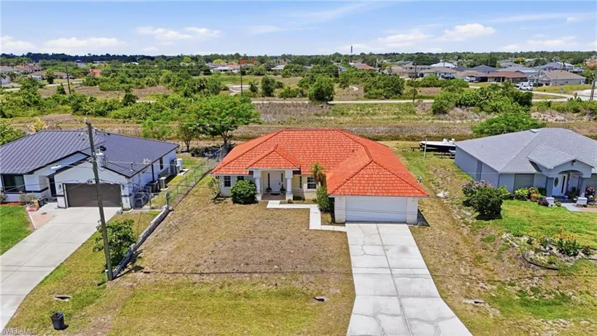 1011  Chadbourne  AVE, Lehigh Acres, FL 33971