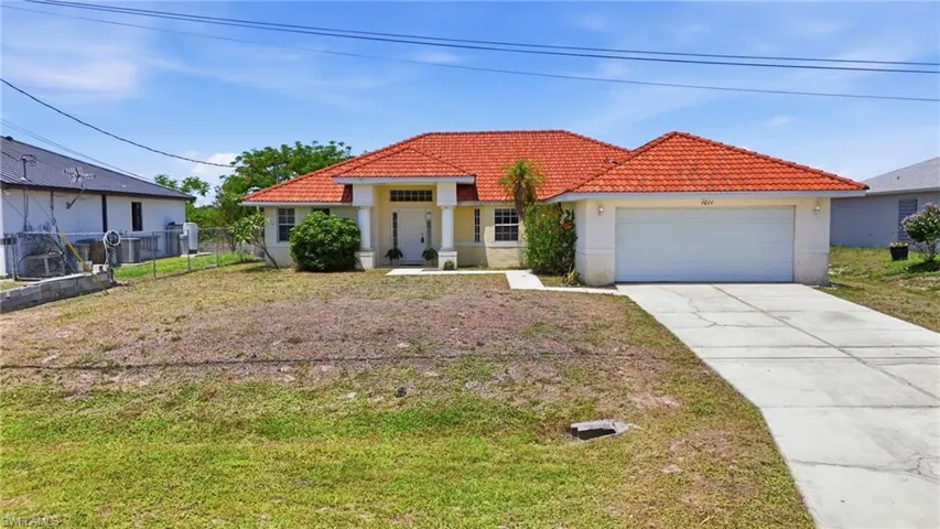 1011  Chadbourne  AVE, Lehigh Acres, FL 33971