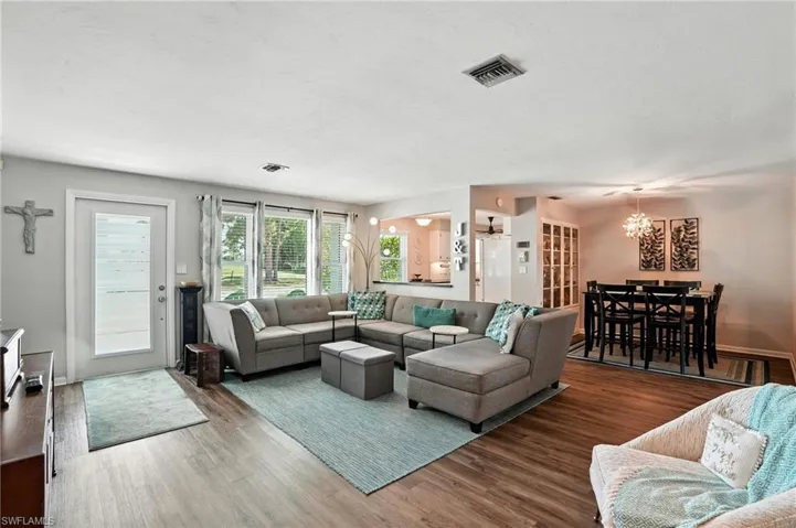 Living area featuring wood finished floors and baseboards