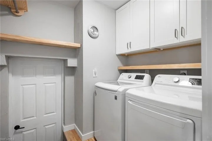 Laundry and exit to small garage
