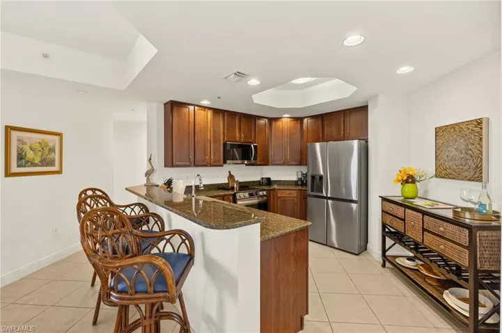 Kitchen with new appliances and granite counter tops