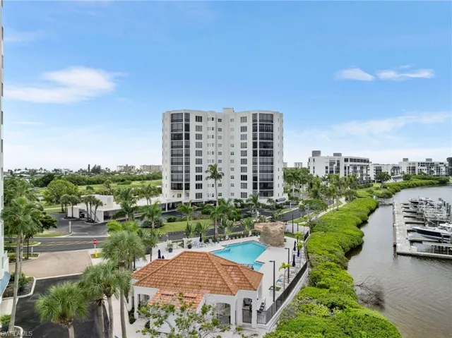 Bird's eye view of a pool and a large body of water