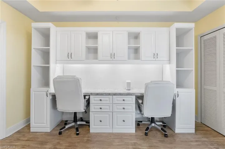 Office flex space and murphy bed featuring light wood-type flooring