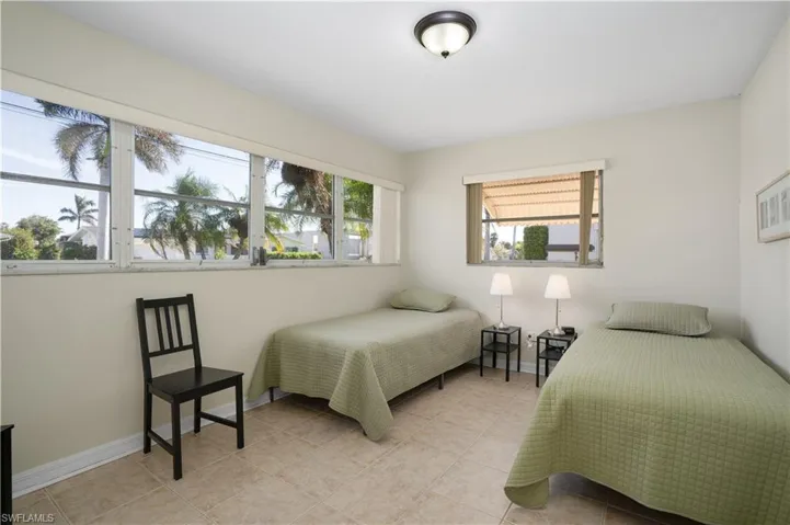 Bedroom featuring light tile patterned flooring
