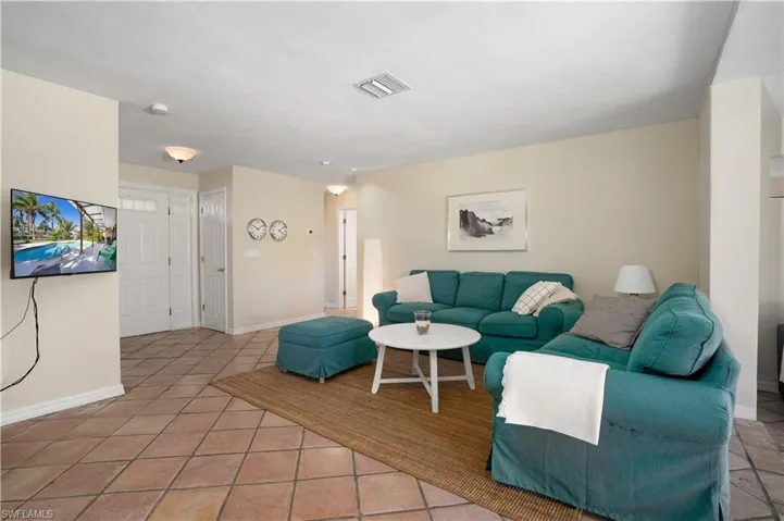 Living room with tile patterned flooring