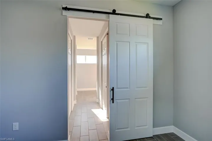 Hallway with a barn door