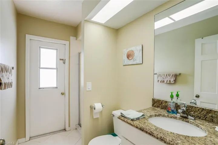 Guest bath #1, leads right out onto the pool!