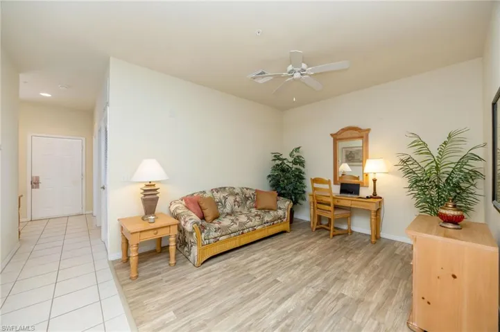 The versatile den can easily serve as a home office, media room, or additional guest accommodations.