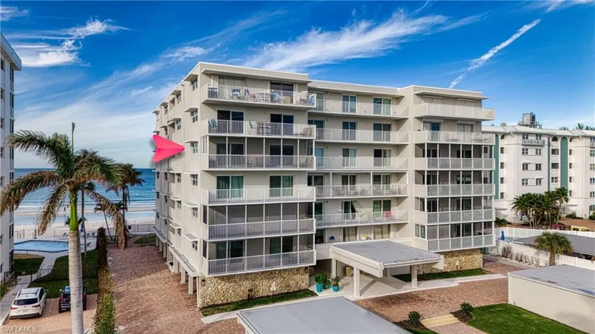 View of building exterior featuring a water view