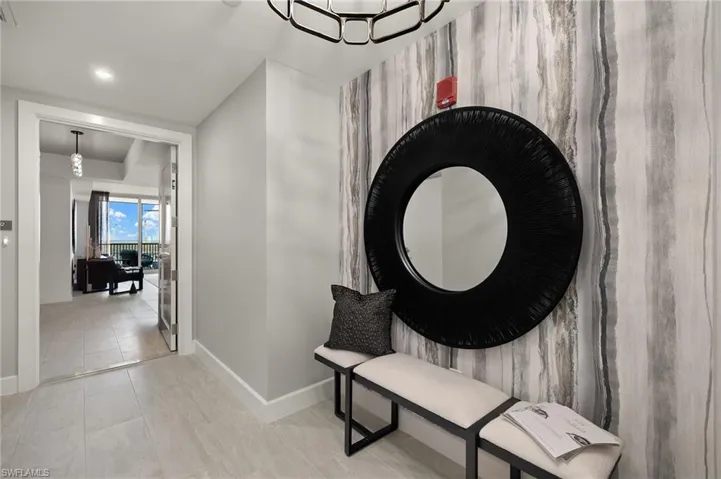 Private entrance features contemporary decor and wallpaper