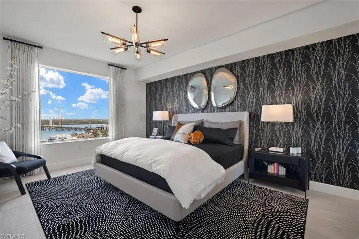 Master Suite features large window with lots of natural lighting , gorgeous statement wallpaper