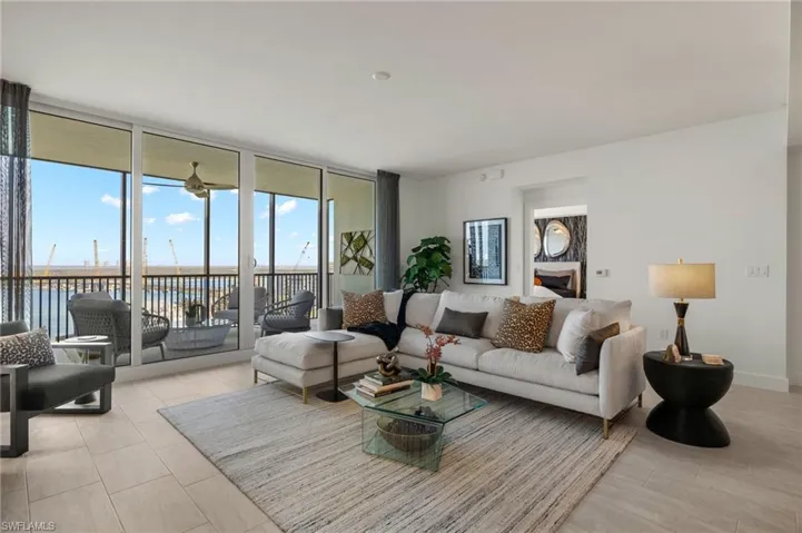 Living room ,large open space, wall to wall sliding glass doors bring in lots of bright light