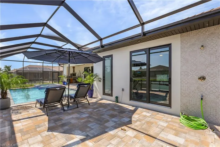 View of patio / terrace with a lanai