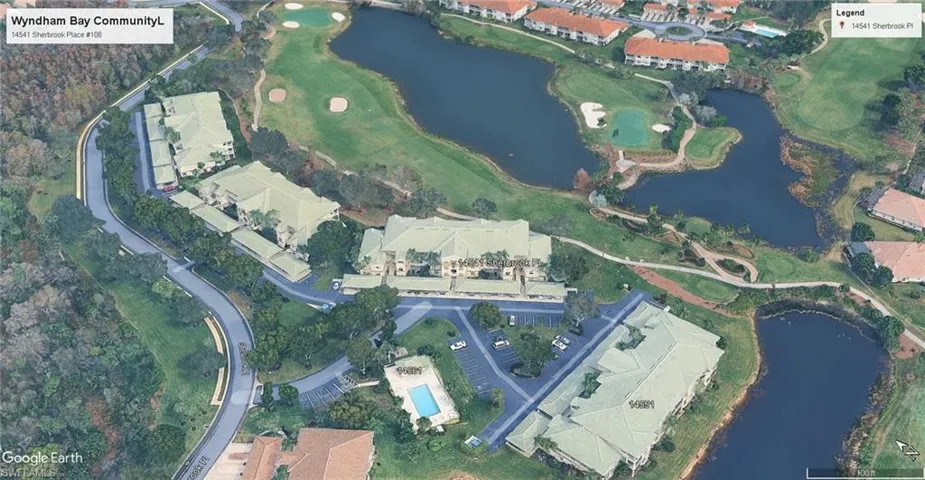 Aerial overview of the Wyndham bay community and pool.