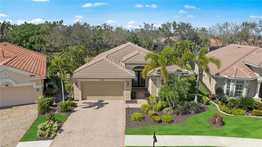 Welcome home to Belle Lago in the heart of Estero!
