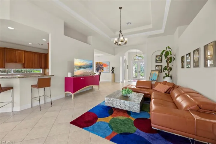 Great room, kitchen beyond