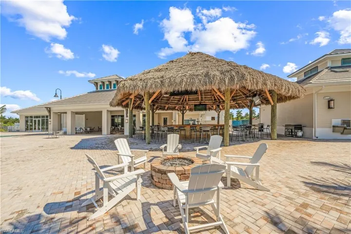 View of tiki bar with a fire pit