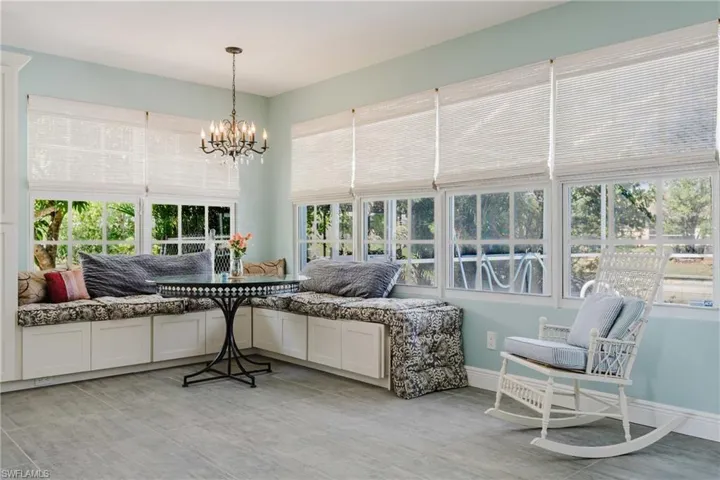 Sunroom with a chandelier