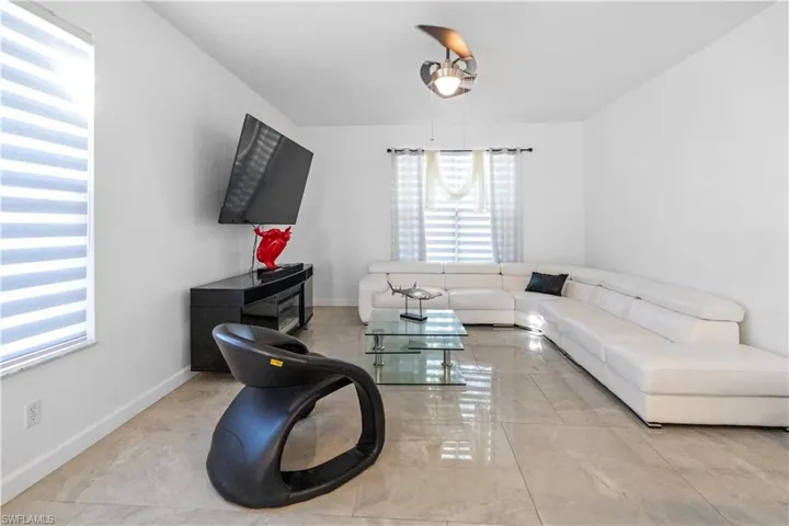 Living room featuring baseboards
