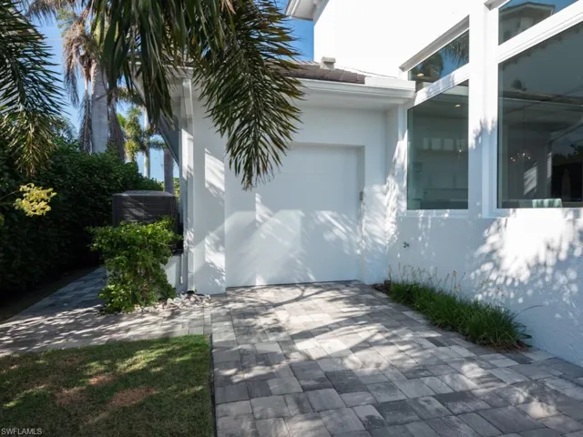 View of home's exterior featuring central air condition unit