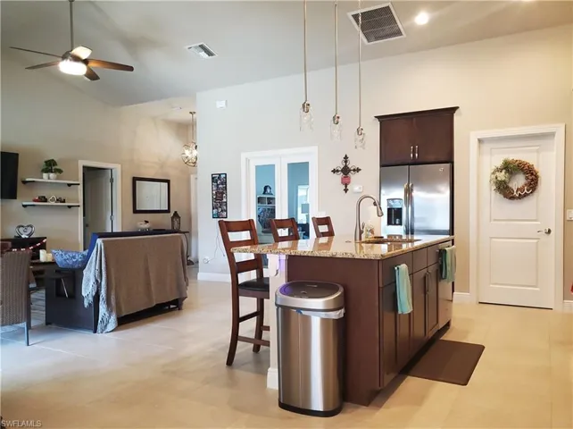 Kitchen overlooking the living room and den