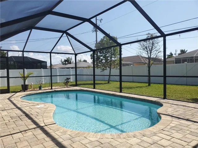 Large screened lanai with paver deck