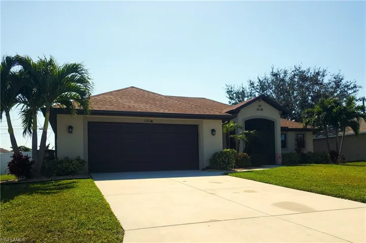 Front of home nicely landscaped