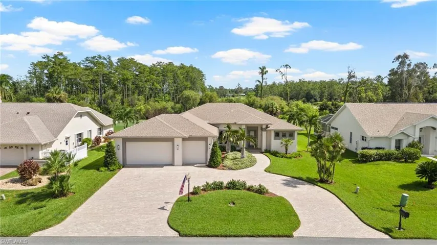 Front view of home and circle driveway.
