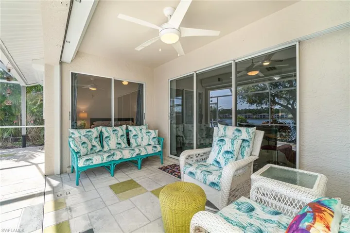 Lanai with sliders to living room and primary bedroom